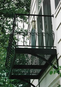 Curved Steel Balcony with Scrolls