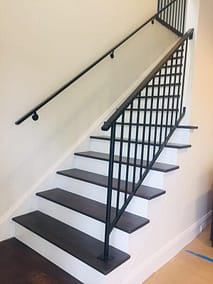 Vertical Railing with hammered top rail and handrail