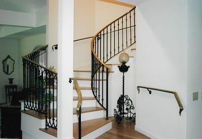 Curved bronze handrail